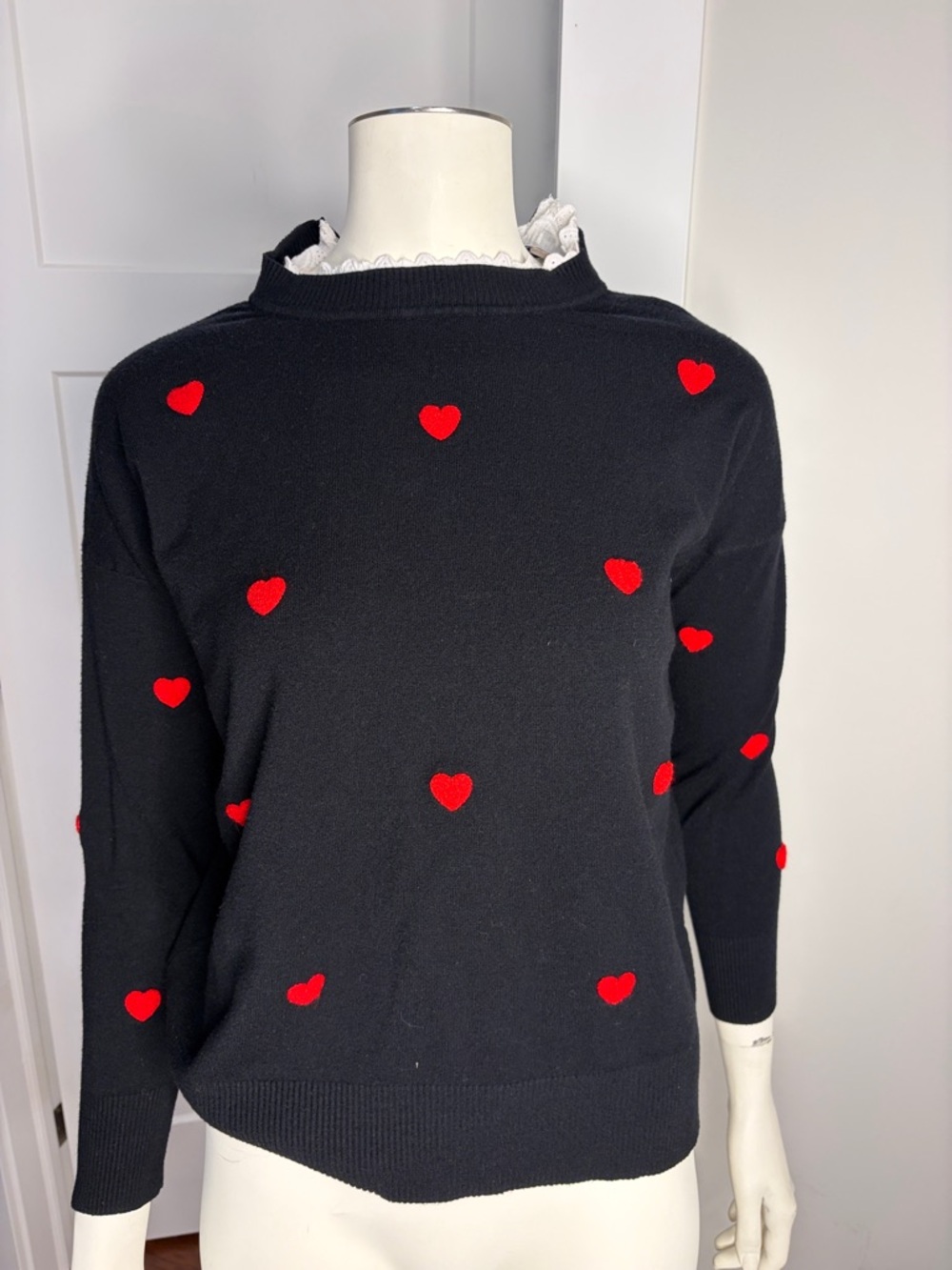 Black Crewneck Sweater with Red Heart Motifs and white lace collar